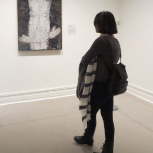 Woman Approaches a Dubuffet Painting at the Met